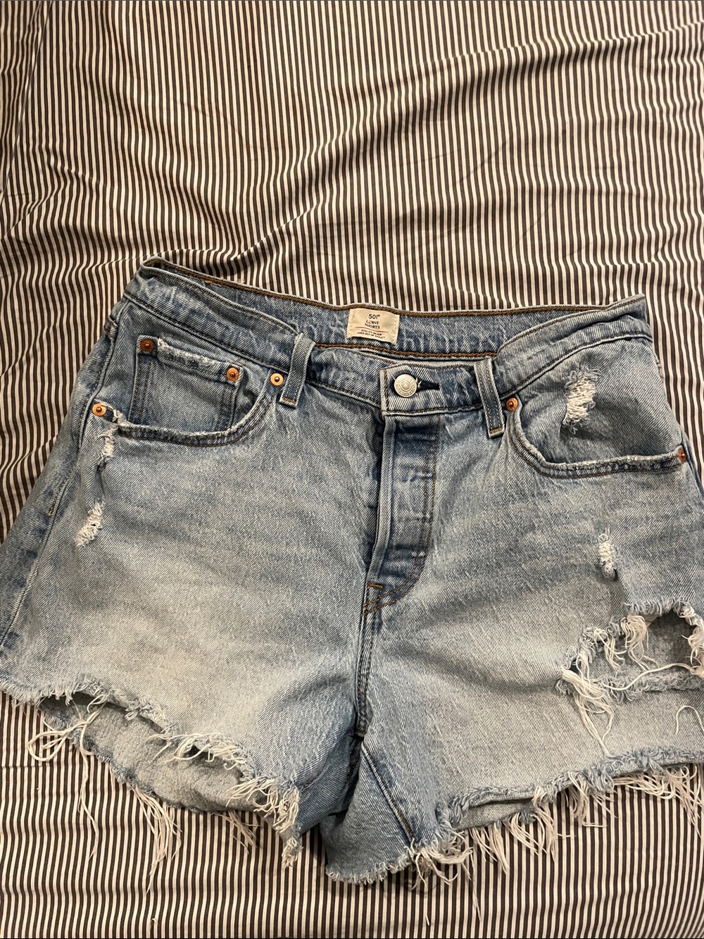Levi's Light Blue Frayed Denim Cutoff Shorts